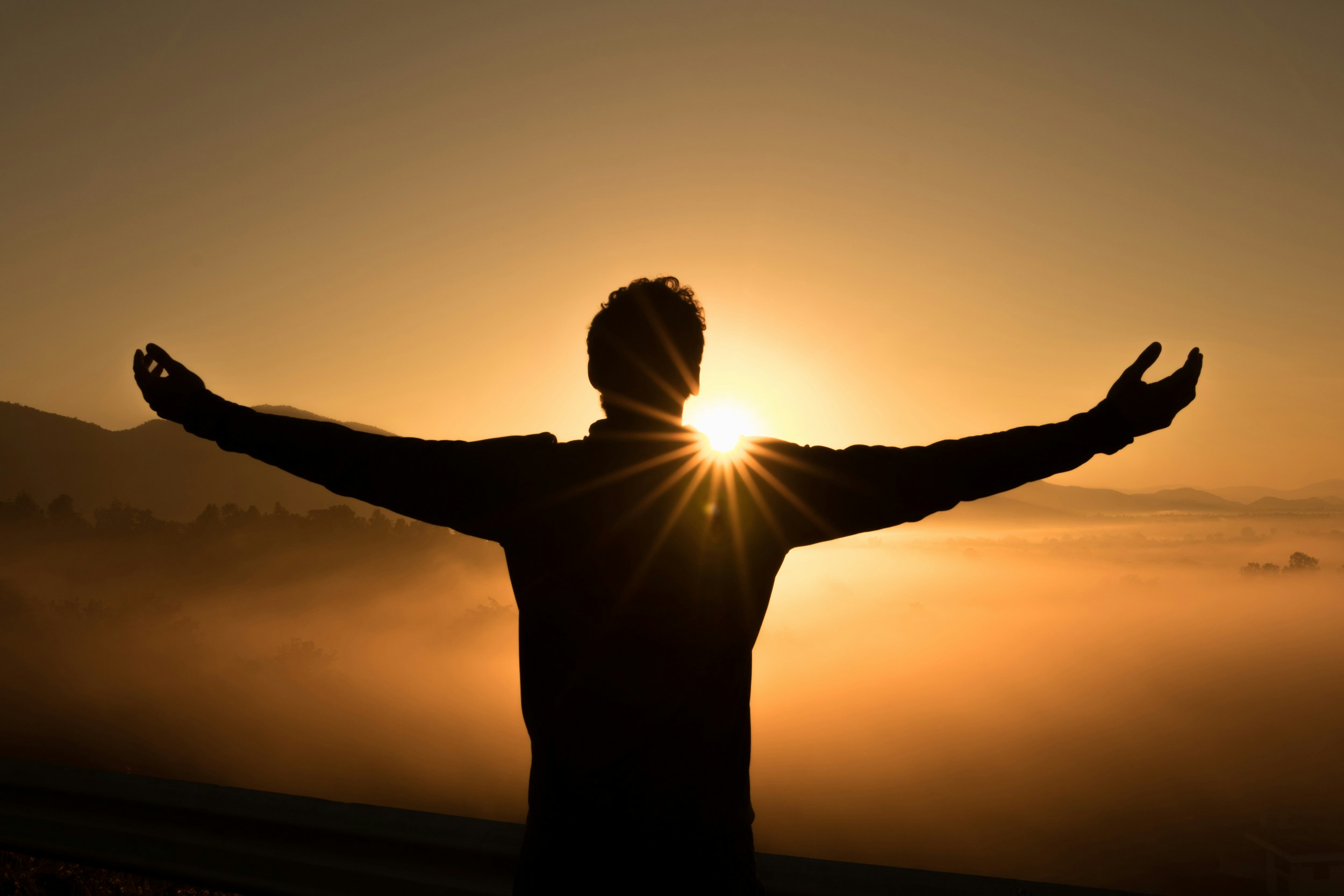 man with open arms